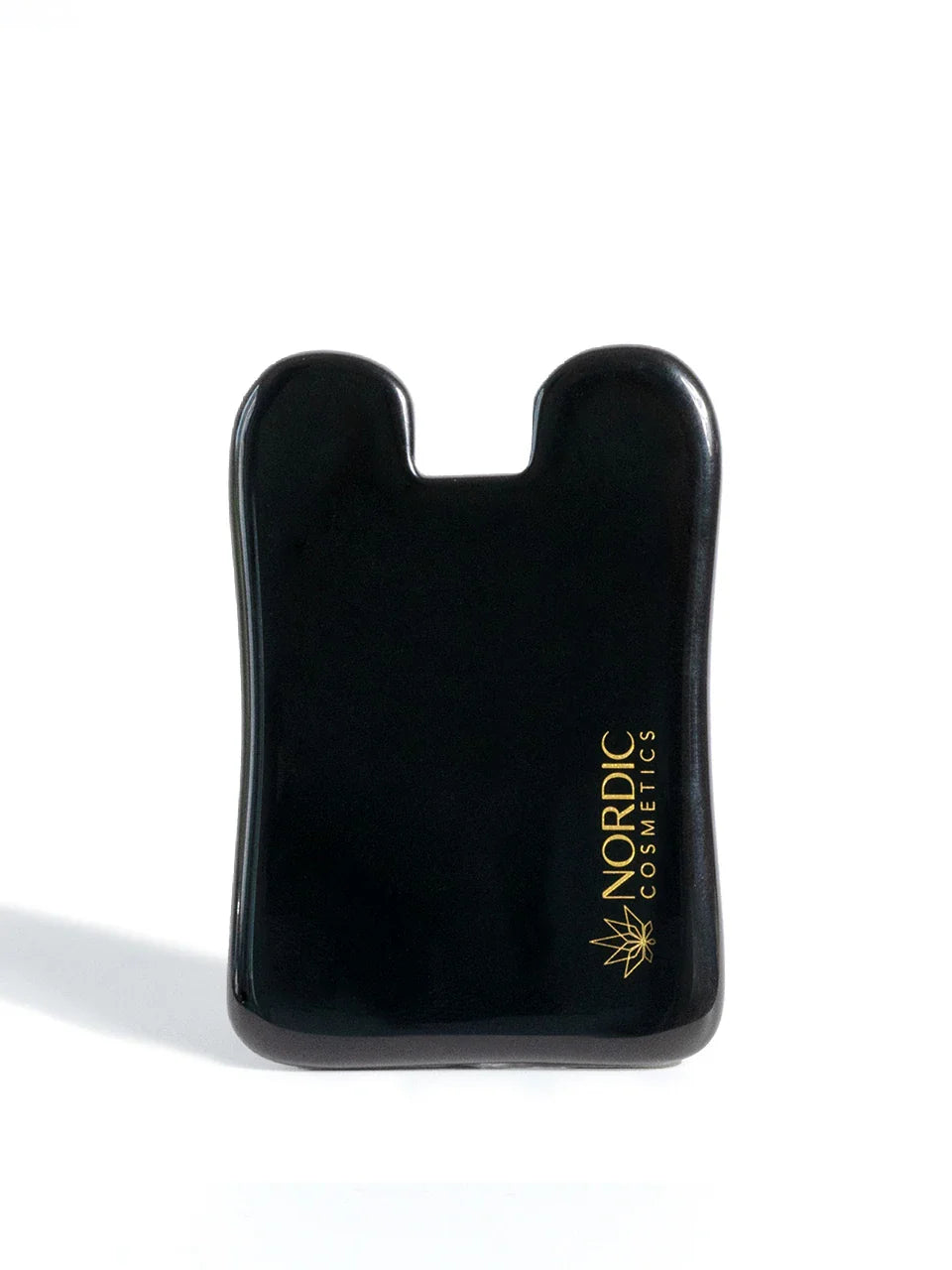 Gua Sha Obsidian von Nordic Cosmetics auf weißem Hintergrund